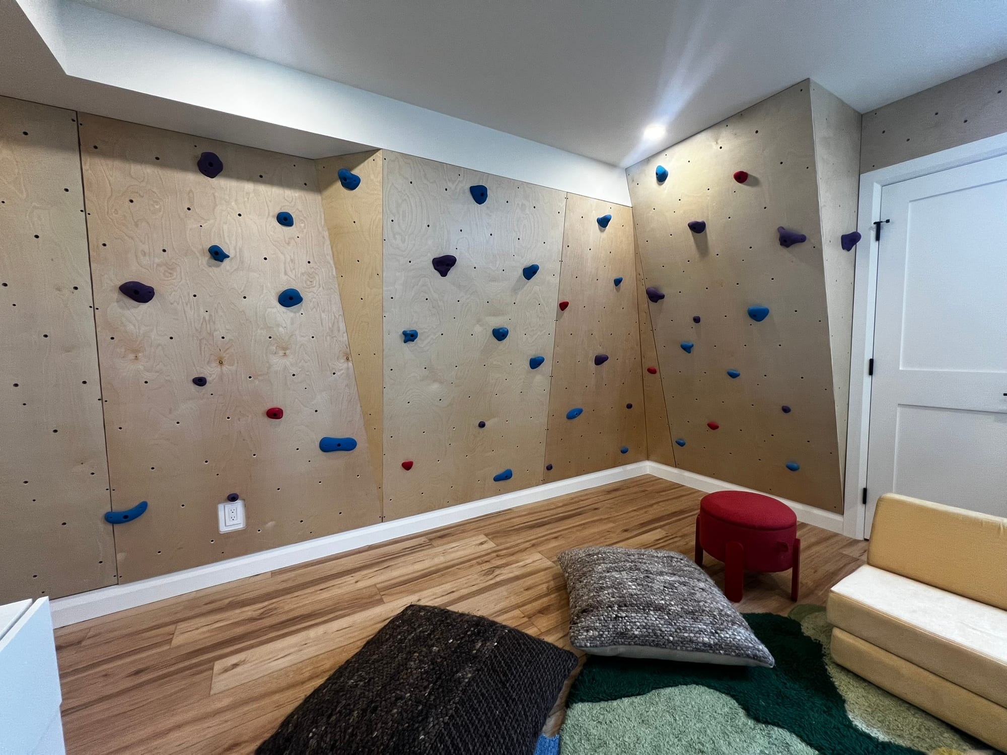 Another view of the climbing wall and finished basement