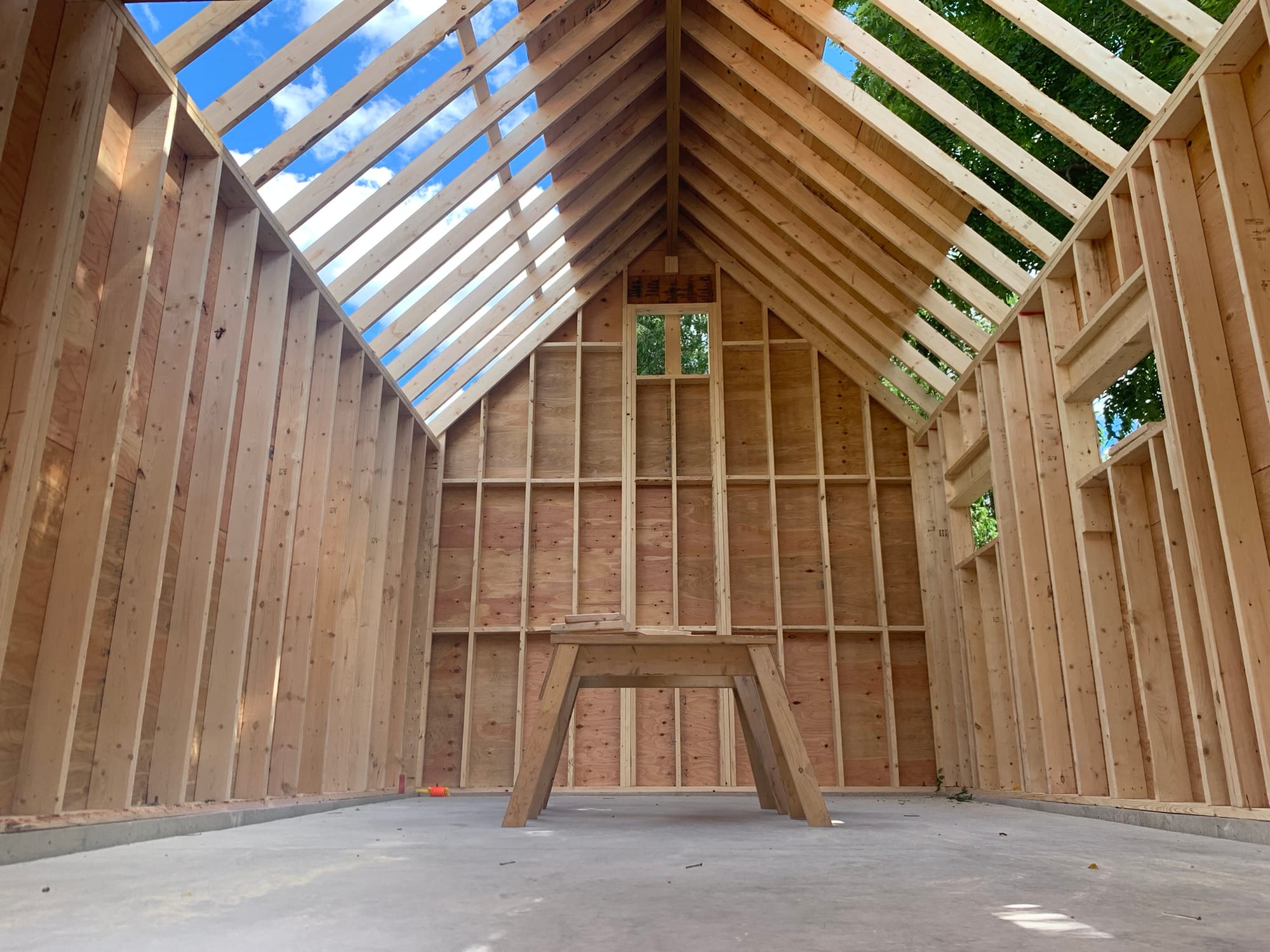 Symmetrical roof framing by Elevation Builders