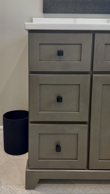 Wood vanity drawer and quartz countertop detail