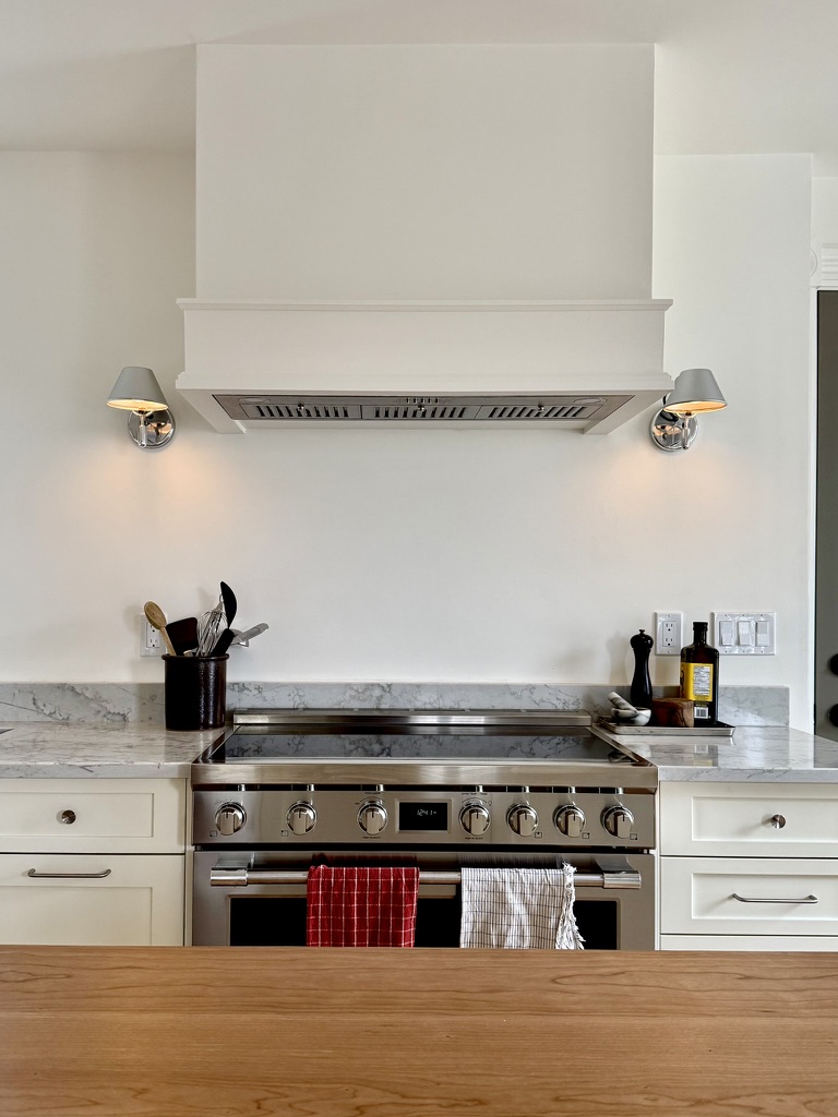Custom built-in range hood and lighting