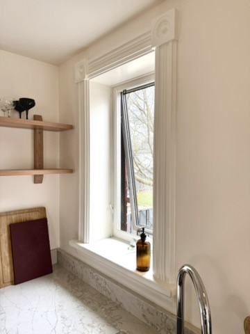 Recreated wood trim at the kitchen window