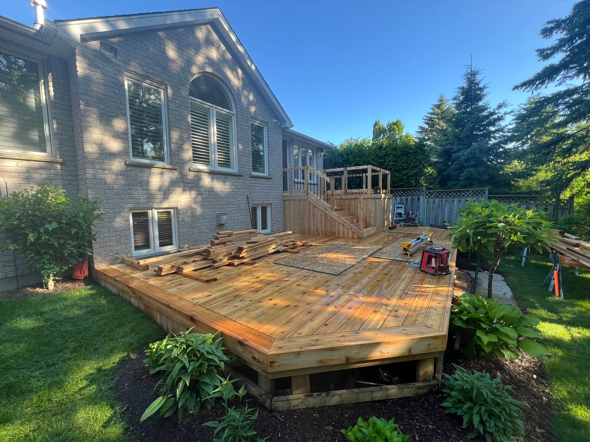 Deck construction and connection to the existing house